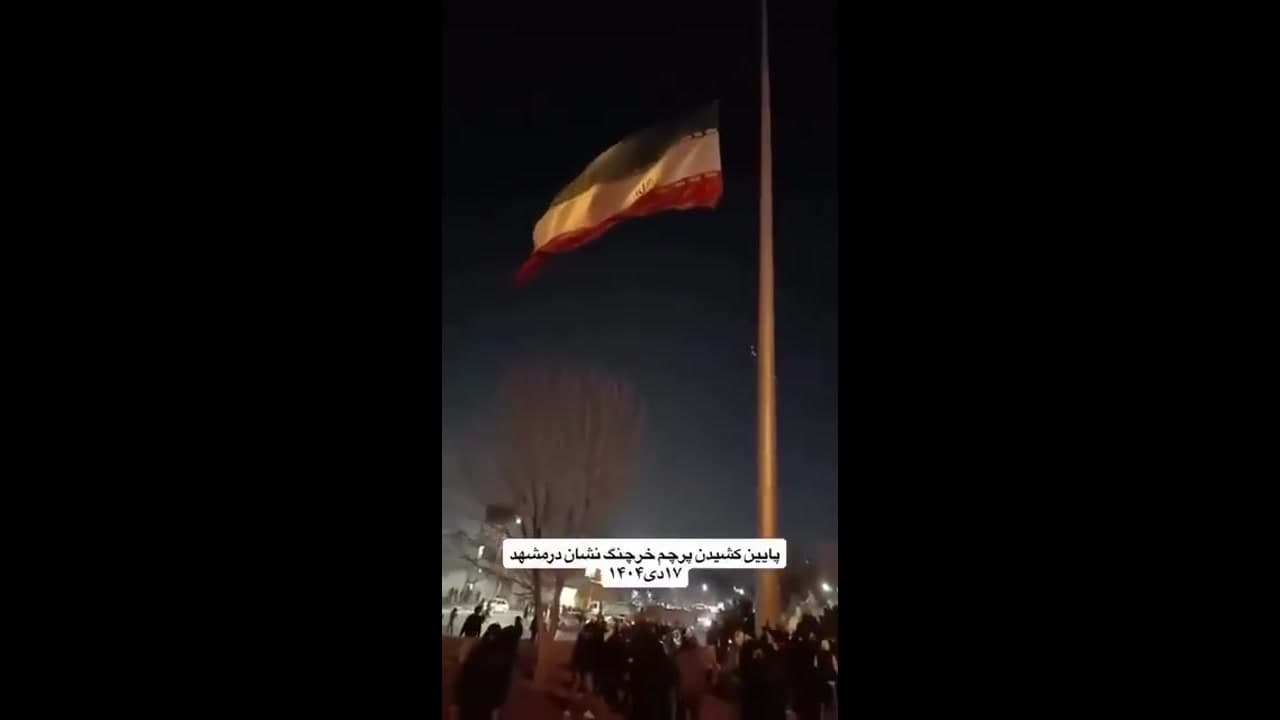 [Video] Protestors tear down flags and portraits in anti-regime protests in Iran