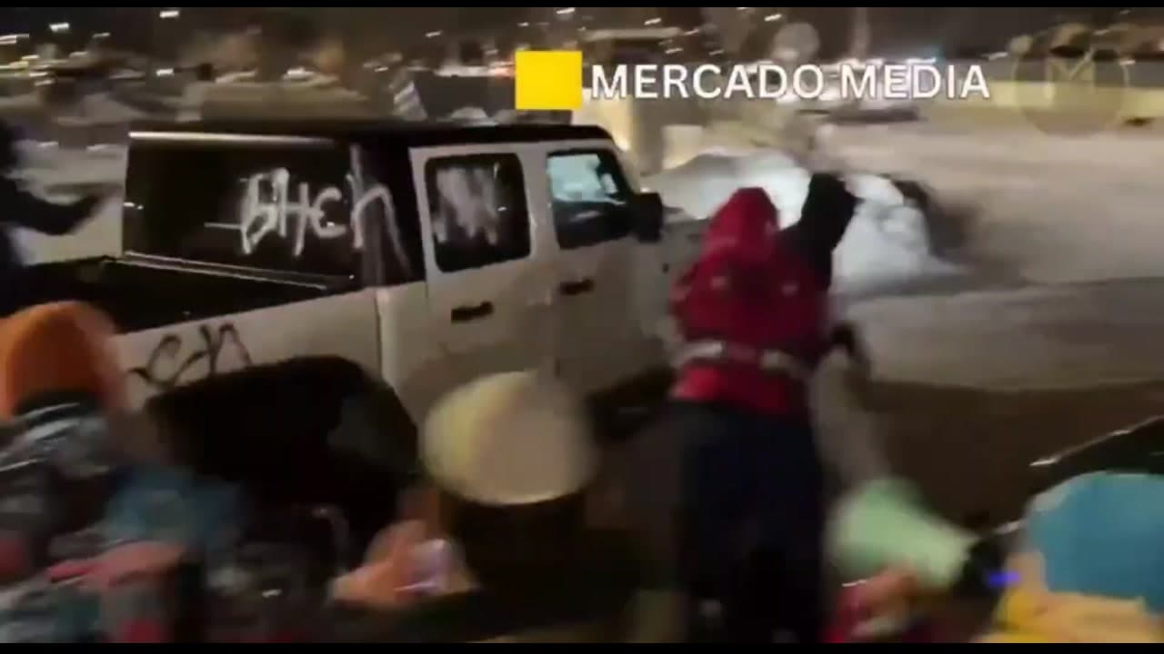 [Video] Vehicle carrying Nick Sortor and Cam Higby attacked by mob in Minneapolis