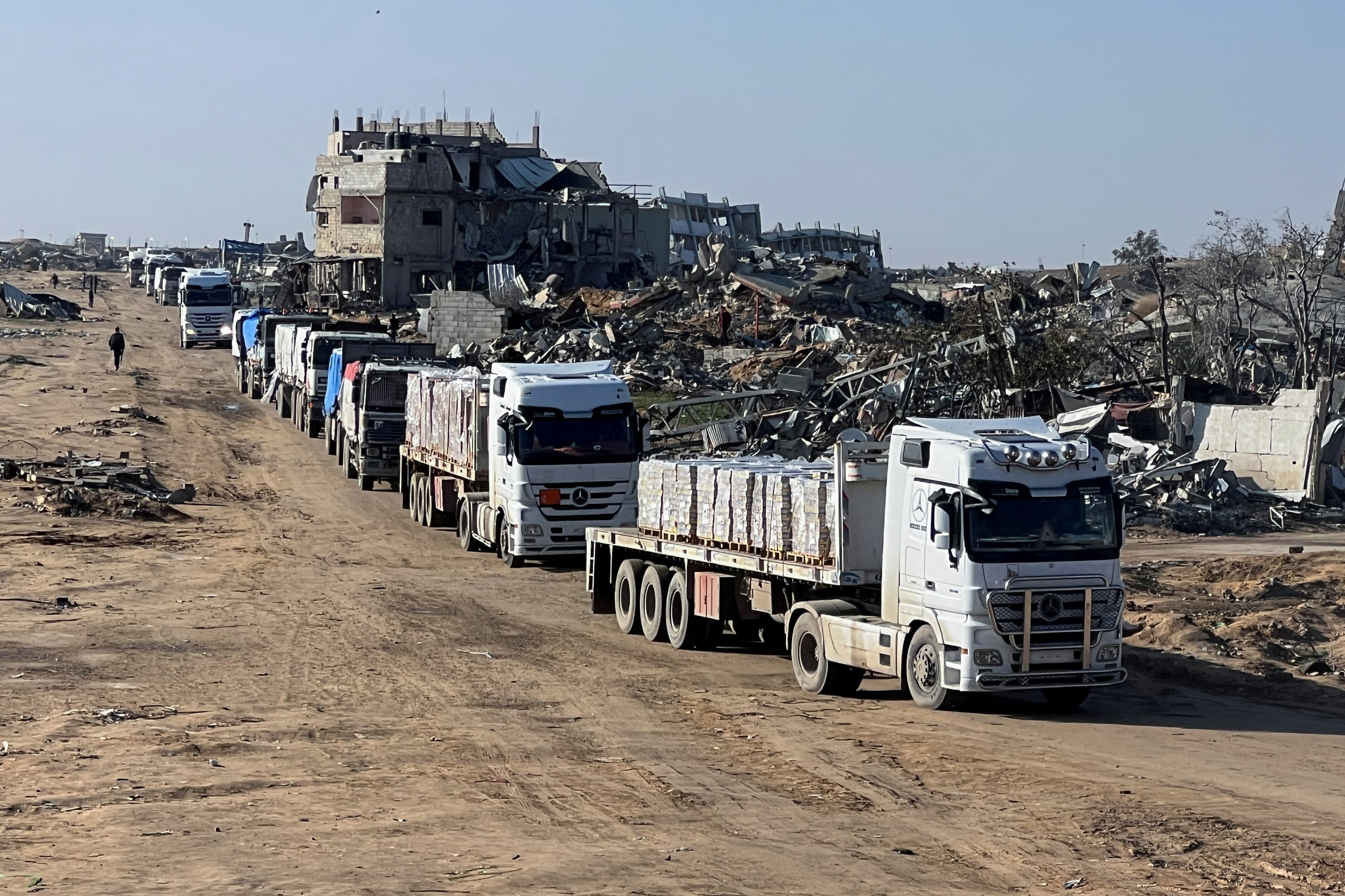 Featured image for: Israel to halve aid trucks to Gaza, citing Hamas ceasefire violations Israel to halve aid trucks to Gaza, citing Hamas ceasefire violations