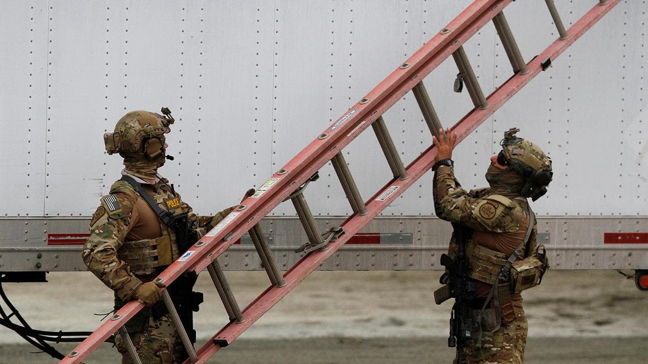 Featured image for: 10,000 Troops Mobilized to Enforce Trump's Border Crackdown Amid Civil Rights Concerns 10,000 Troops Mobilized to Enforce Trump's Border Crackdown Amid Civil Rights Concerns