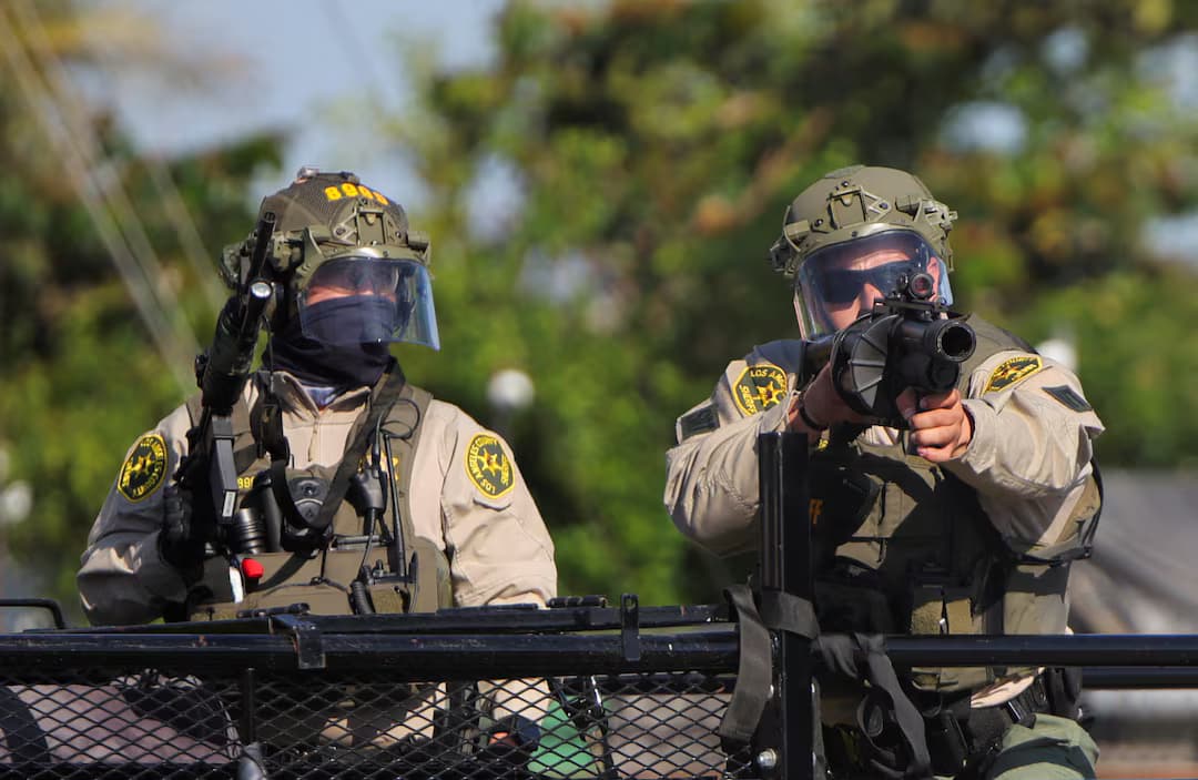 Featured image for: Masked Agents and Impersonators: A Dangerous Game Endangering Immigrant Lives Masked Agents and Impersonators: A Dangerous Game Endangering Immigrant Lives