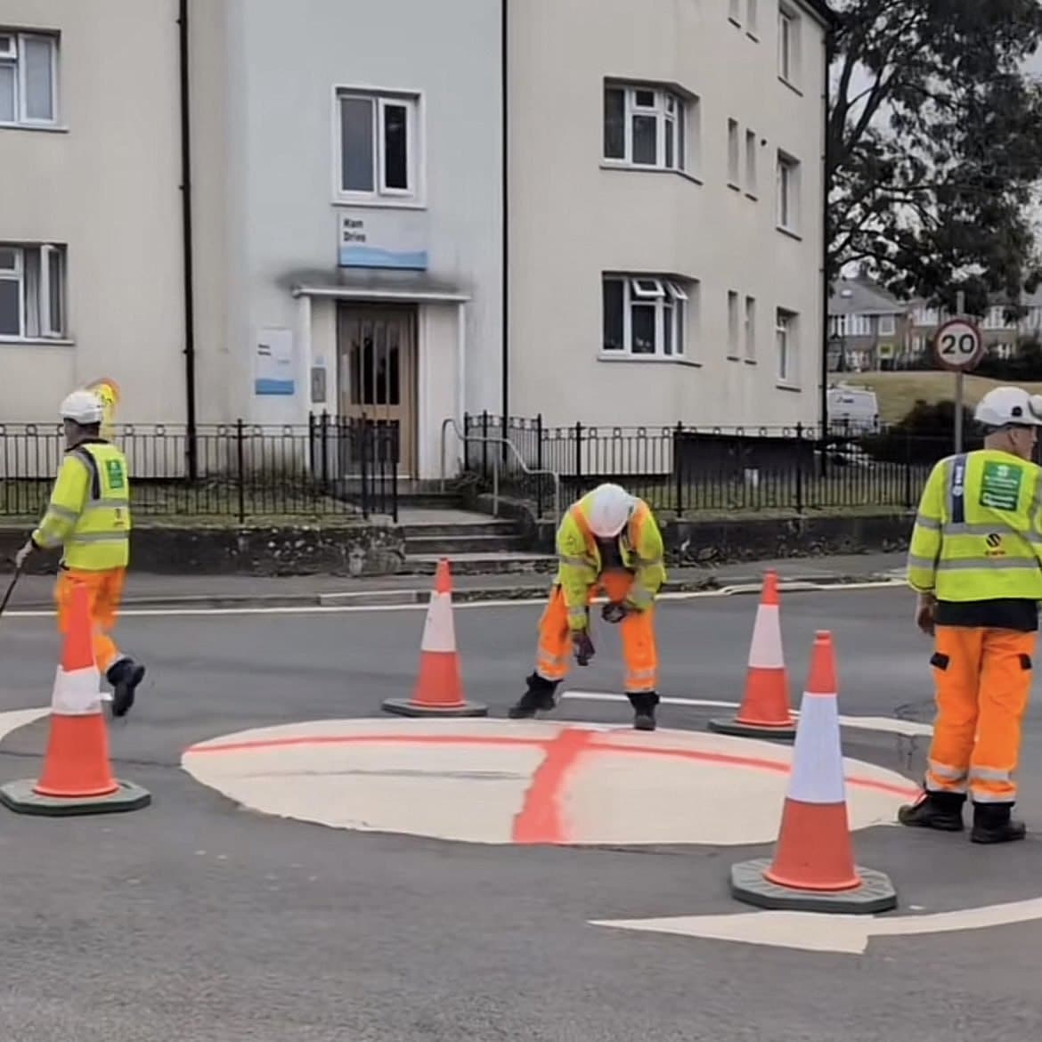 Featured image for: Plymouth Roundabout Repainted White, Locals Respond with Red Cross Plymouth Roundabout Repainted White, Locals Respond with Red Cross