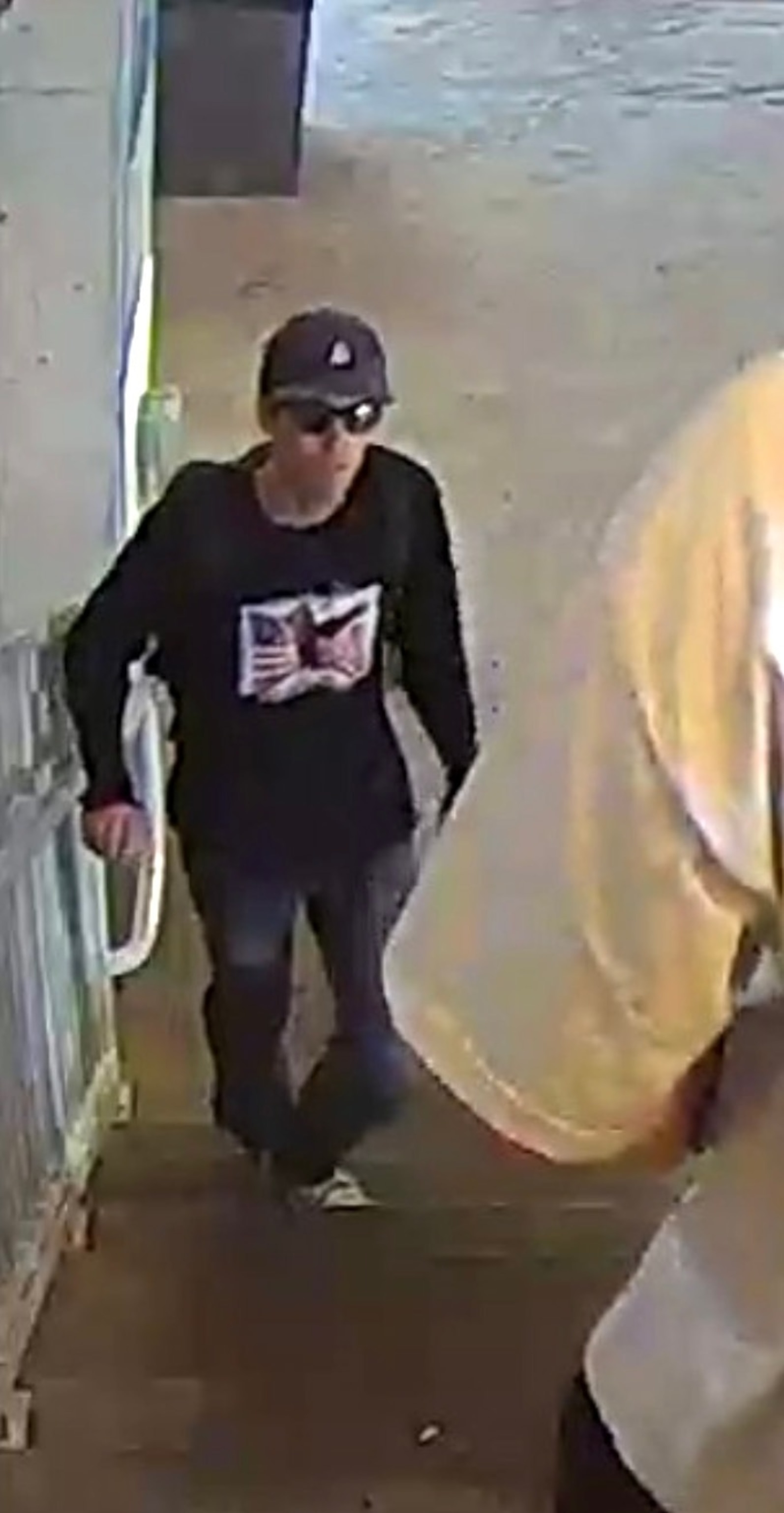 Image for Surveillance Shows Tyler Robinson on Phone Before Roof Climb