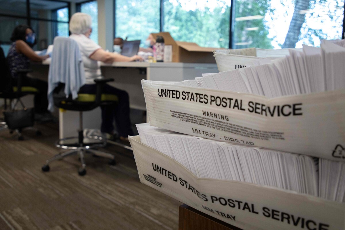 Federal judge temporarily blocks Postal Service from sending ...
