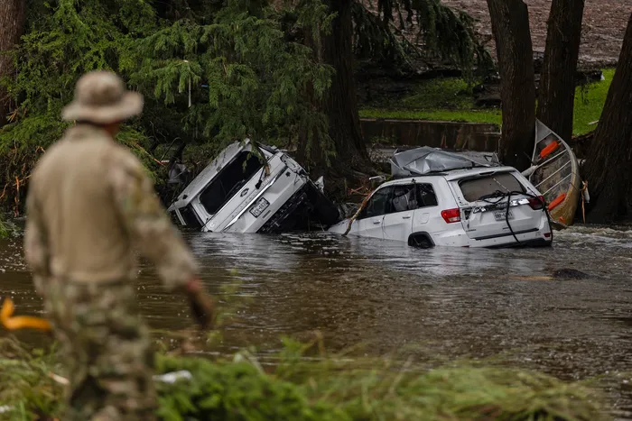 Texas flooding kills dozens, search for missing campers continues