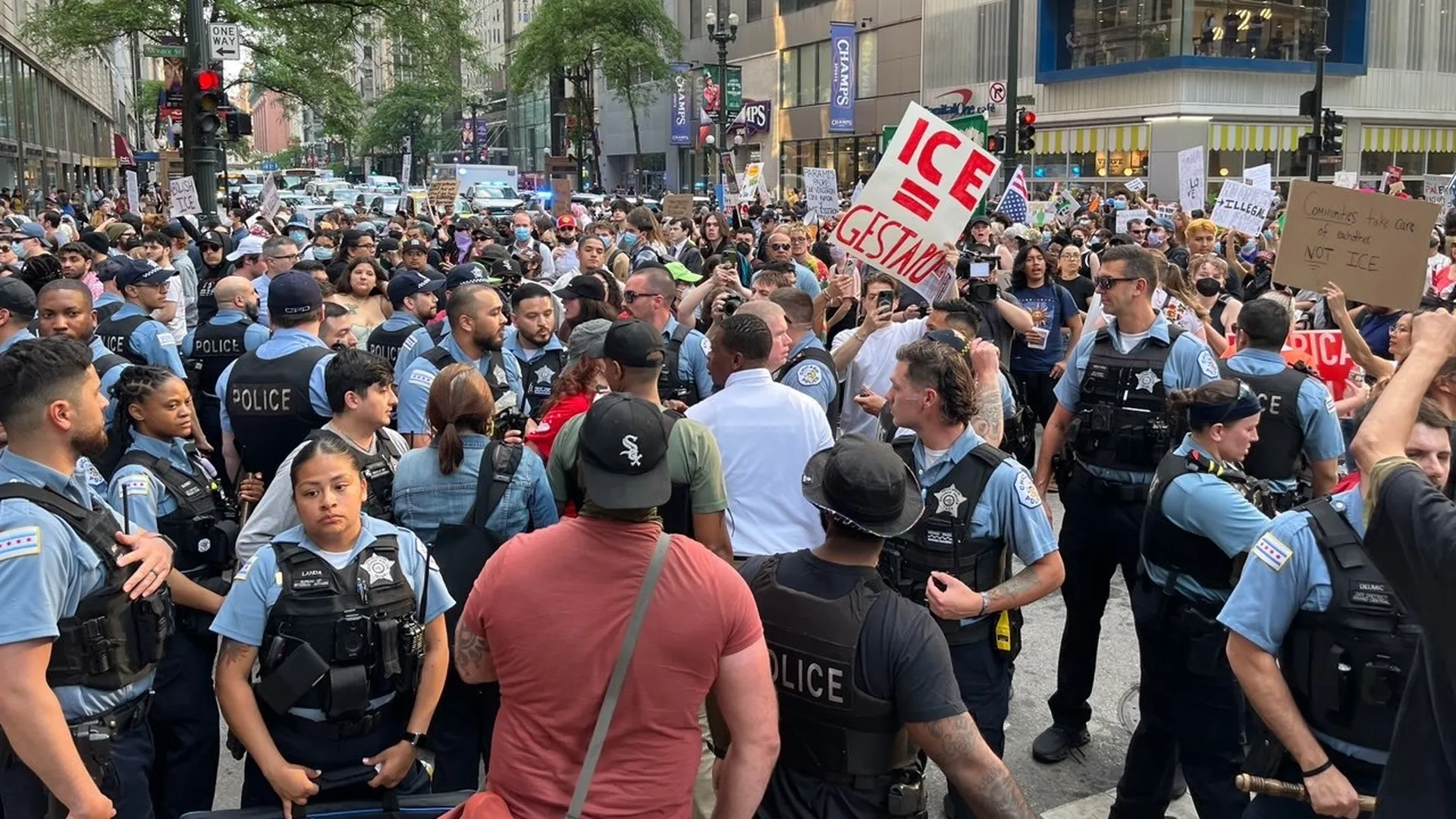 Chicago joins ICE protests as thousands march downtown ...