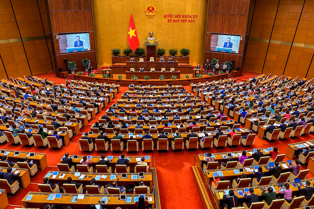 Vietnam parliament approves plan for leaner government | Reuters
