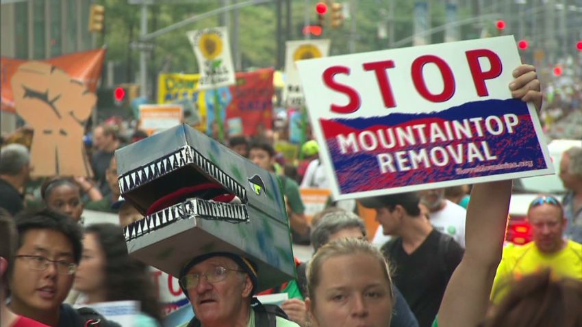 Marchers sound urgent call for climate change action | CNN