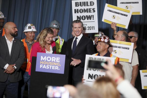 California governor signs laws to boost housing production ...