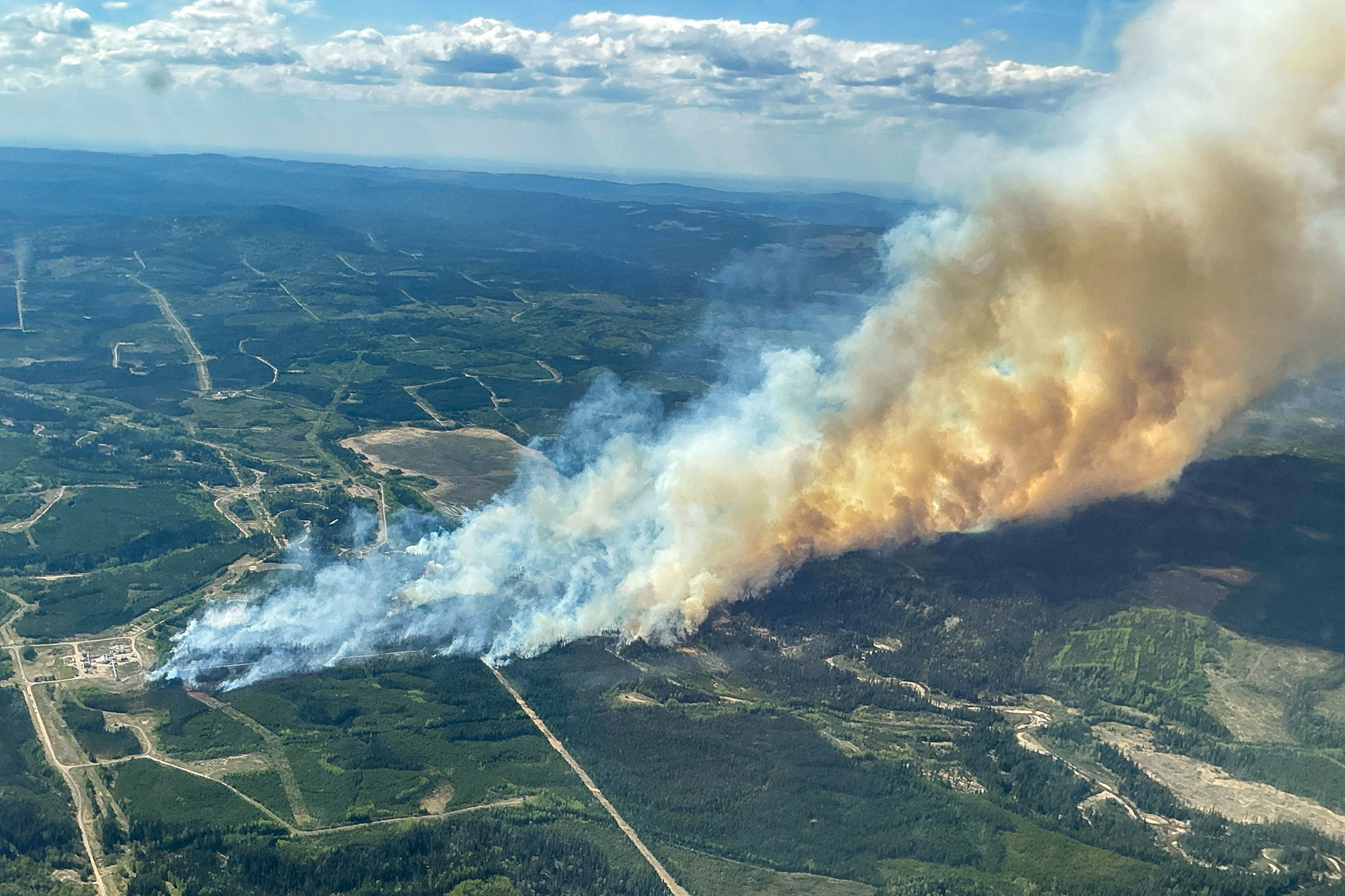 Wildfire in Alberta disrupts oil operations and prompts ...