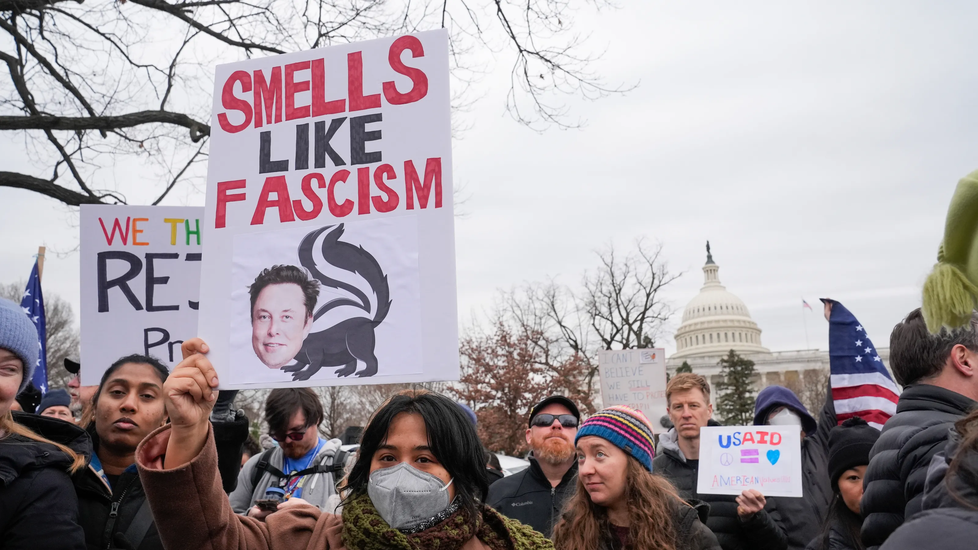 Protest outside USAID offices after Elon Musk vows to shut agency down