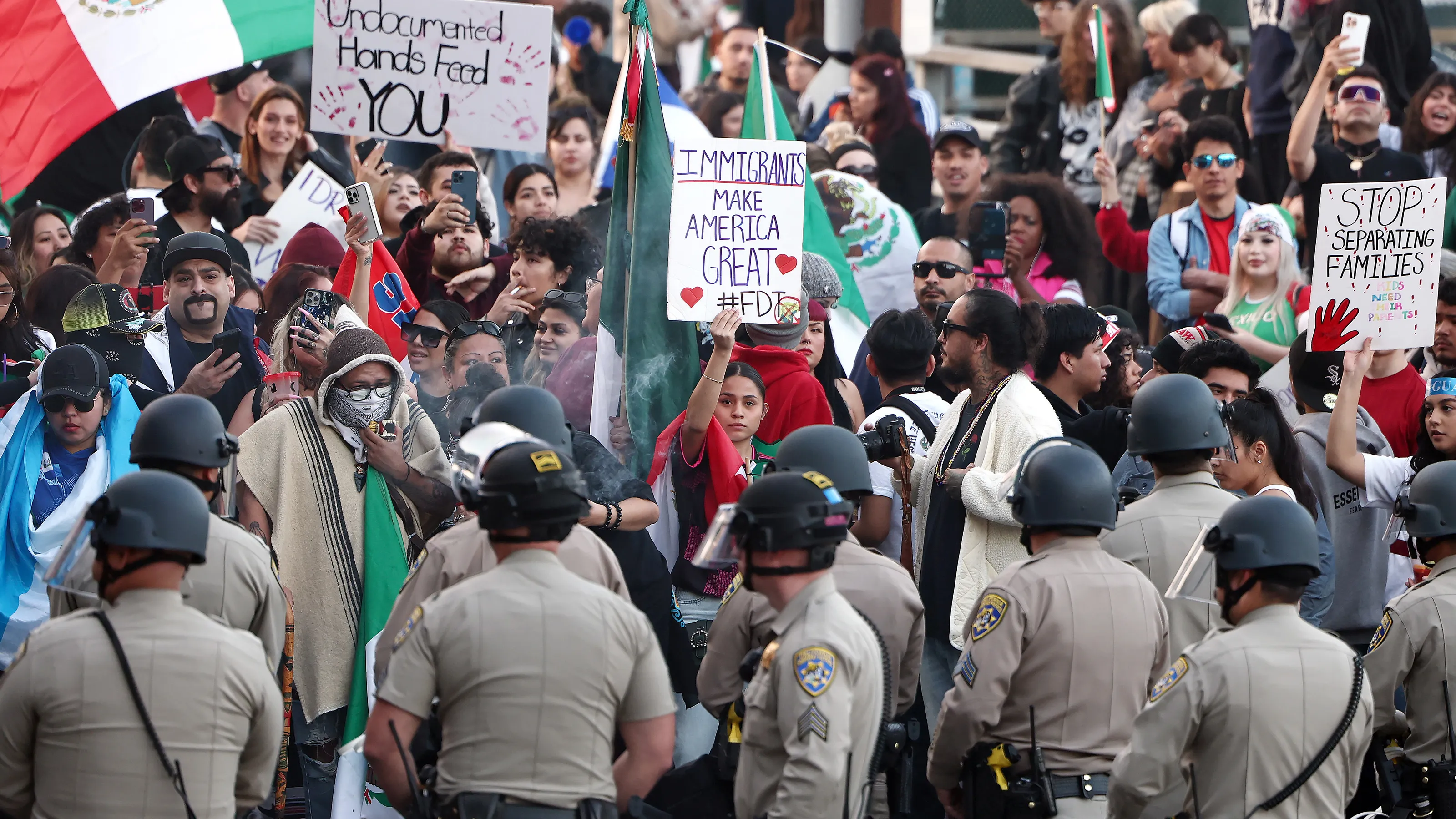 Anti-deportation protesters block 101 freeway in Los Angeles