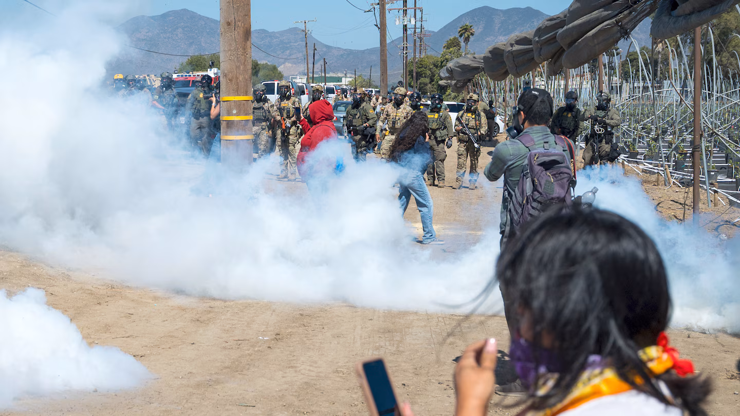 Protesters, federal agents clash near California farm