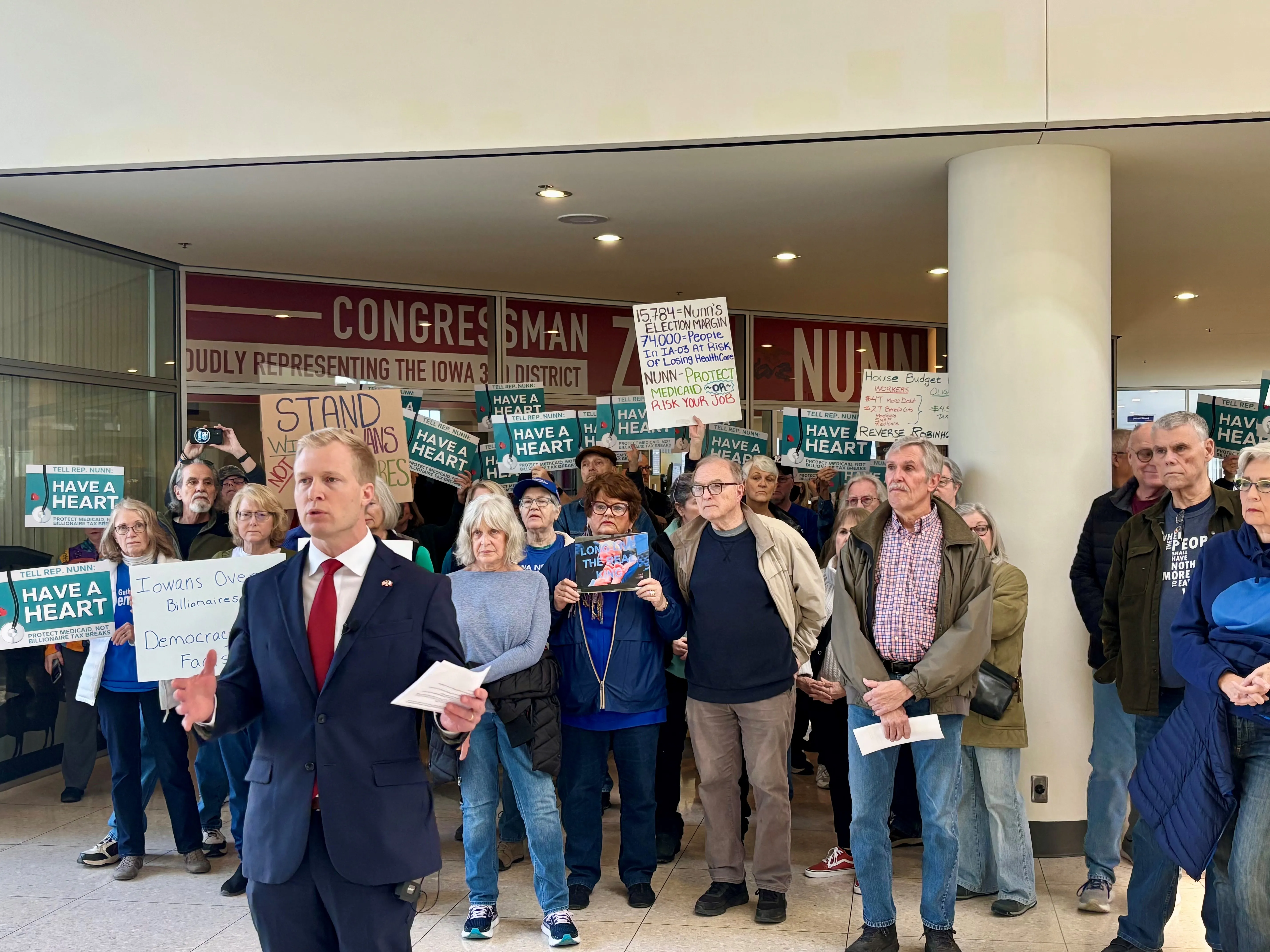 Iowa Democrats protest potential Medicaid cuts outside Nunn