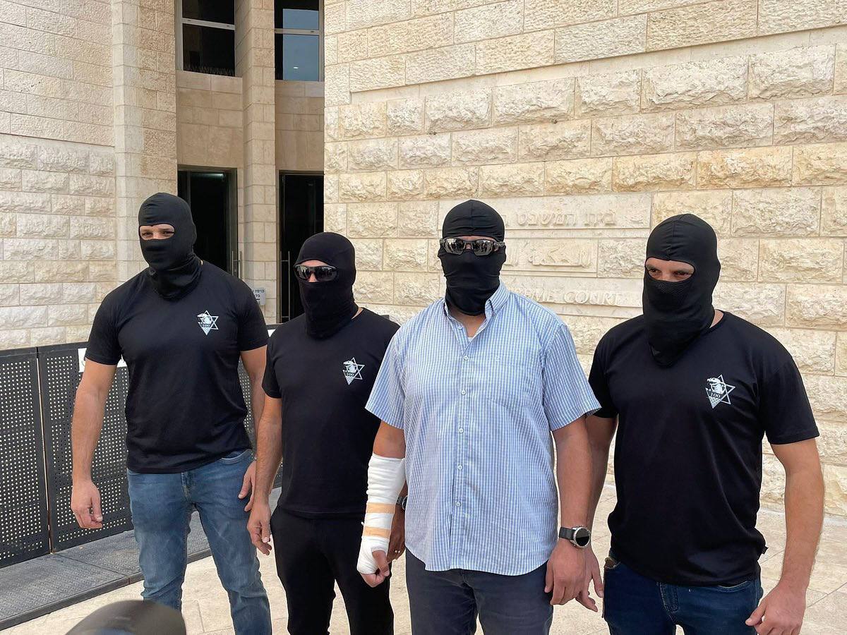 Israeli soldiers accused of assault seen in masks at press conference