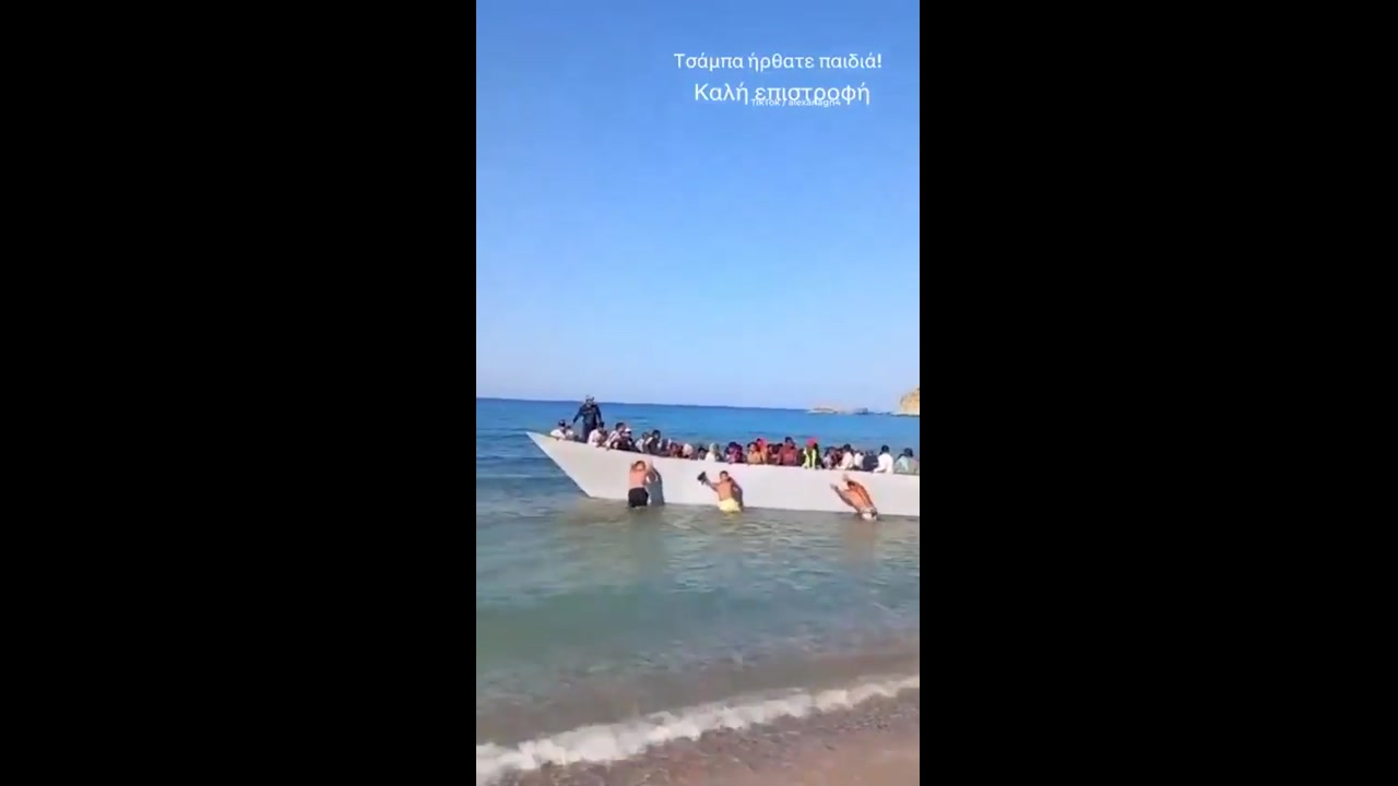[Video] Tourists push back migrant boat from Greek shores in Milos Island