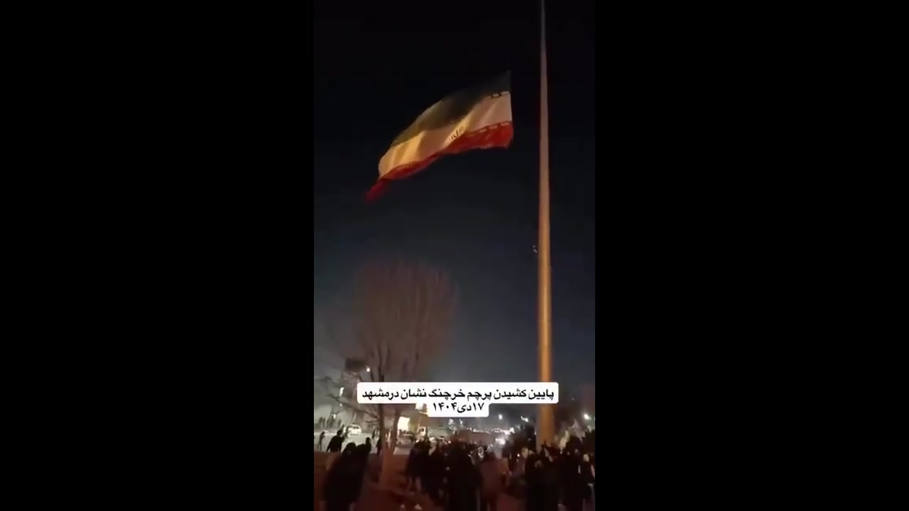 [Video] Protestors tear down flags and portraits in anti-regime protests in Iran